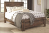 Trinell - Panel Bedroom Set