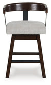 Haddigan - Upholstered Swivel Barstool (Set of 2) - Dark Brown